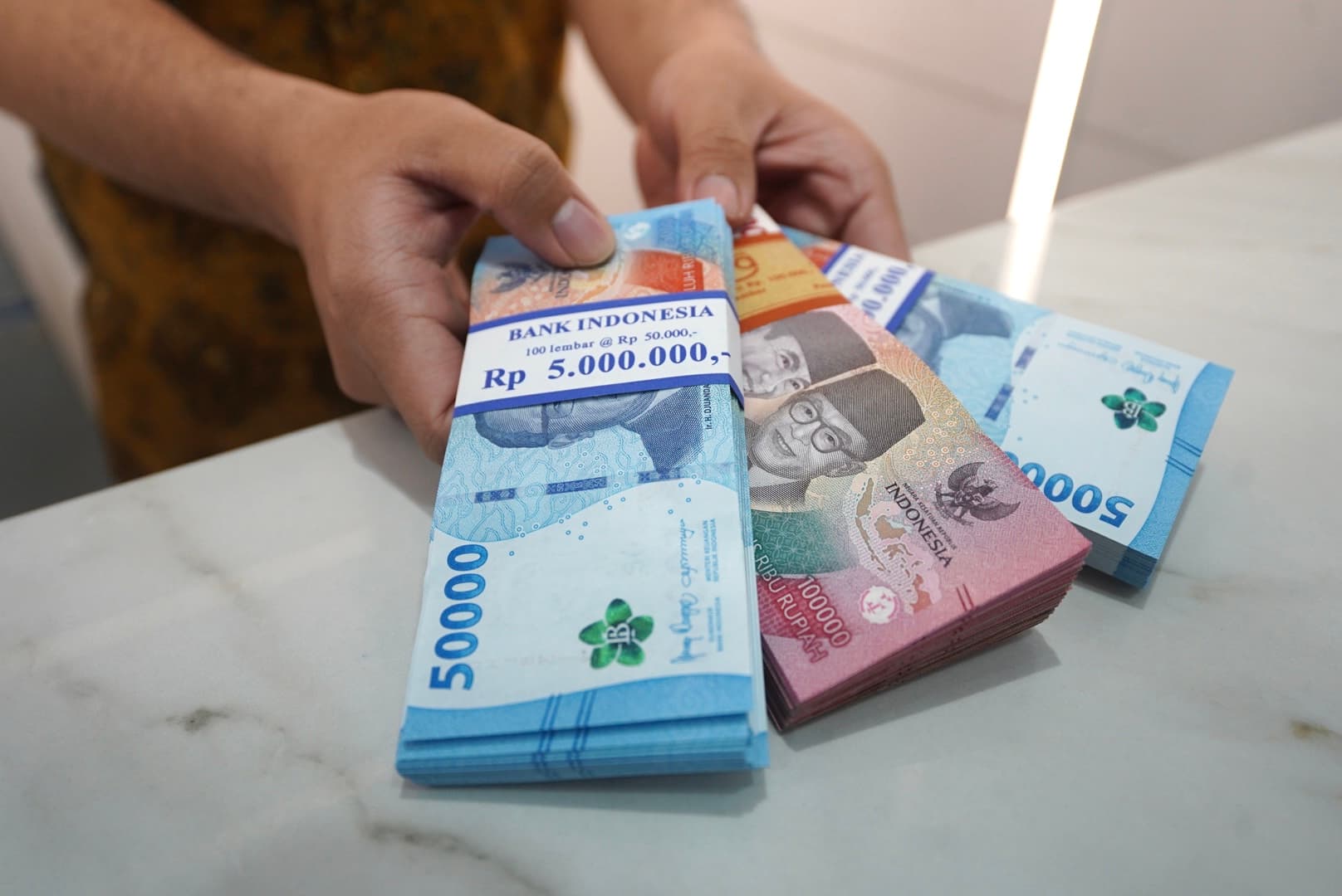 Rupiah Bergerak Menguat pada Awal Perdagangan Jumat